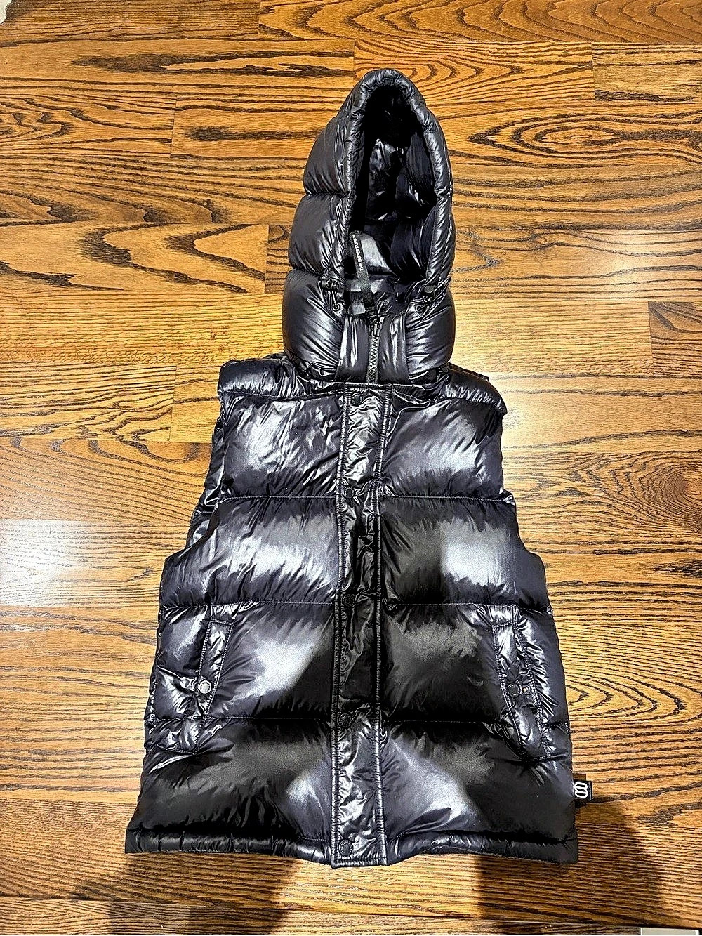 The Super Puff Black Hooded Puffer Vest Like New